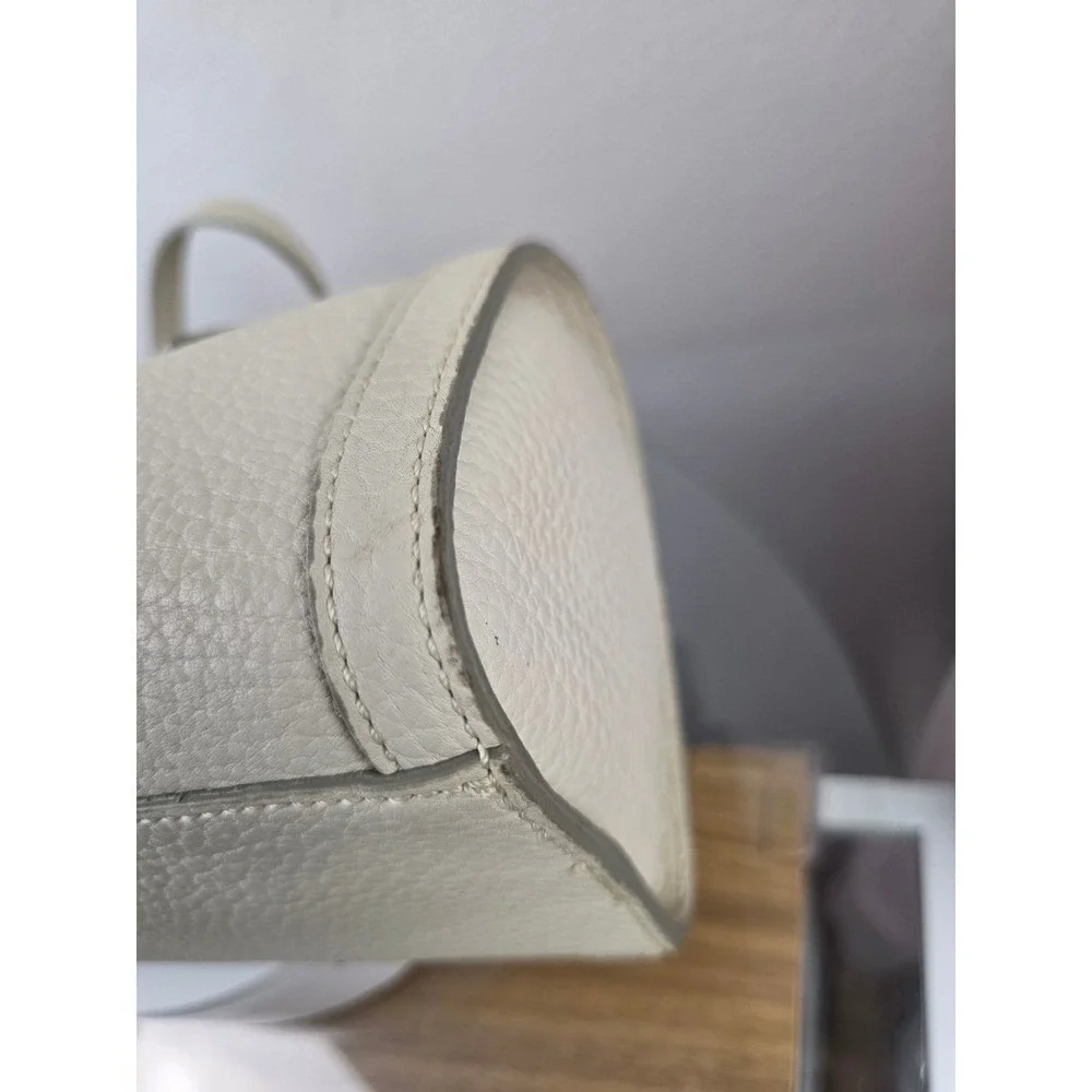 Dooney & Bourke Cream Pebbled Leather Barrel Shoulder Bag Marbled Lining